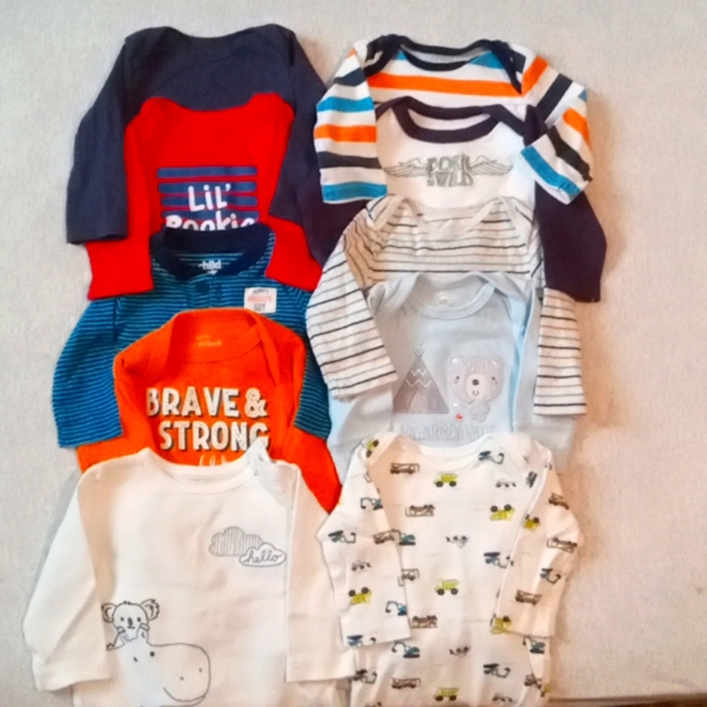 0-3 month bundle of 7 long sleeved onesies. Various brands.